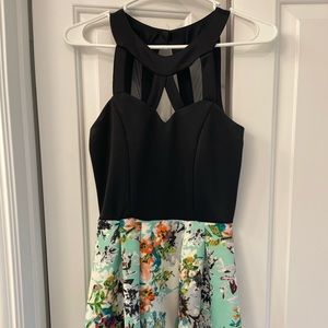 Crystal Doll cocktail dress with straps back details and floral bottom